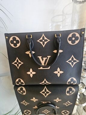 100% Authentic LOUIS VUITTON  ON THE GO TOTE in Bi Color Empriente Giant Leather
